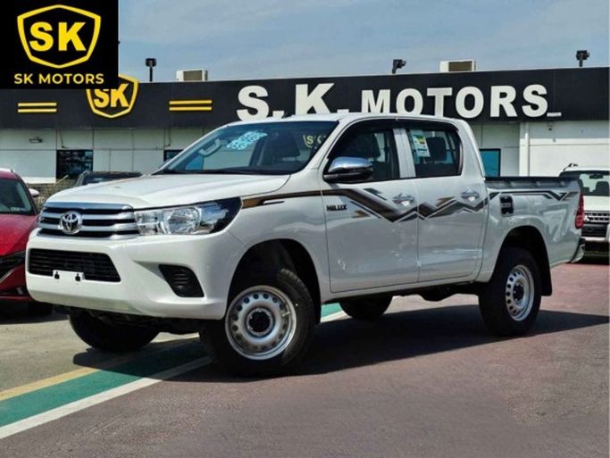 New Toyota Hilux VIII Facelift 2, 2.7 l, 2024 in Dubai by SK Motors, White color. GCC Specs | AUTO.AE