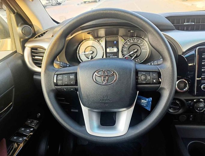 New Toyota Hilux VIII Facelift, 4.0 l, 2024 in Dubai by SK Motors, White color. GCC Specs | AUTO.AE