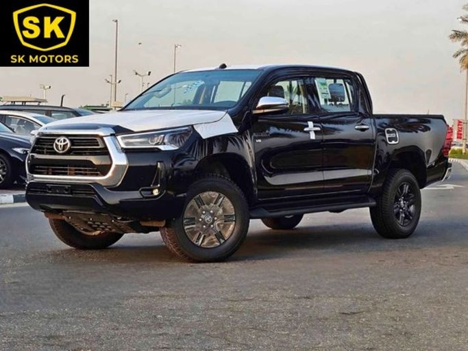 New Toyota Hilux VIII Facelift, 4.0 l, 2024 in Dubai by SK Motors, Black color. GCC Specs | AUTO.AE