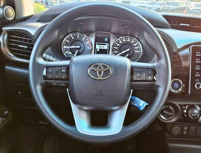 New Toyota Hilux VIII Facelift, 4.0 l, 2024 in Dubai by SK Motors, Black color. GCC Specs | AUTO.AE