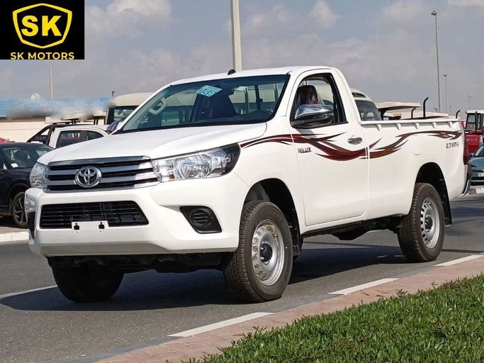 New Toyota Hilux VIII Facelift, 2.7 l, 2024 in Dubai by SK Motors, White color. GCC Specs | AUTO.AE