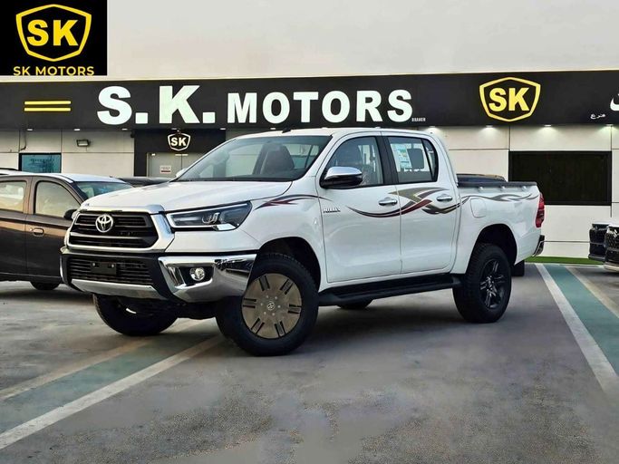 New Toyota Hilux VIII Facelift 2, 2.7 l, 2025 in Dubai by SK Motors, White color. GCC Specs | AUTO.AE