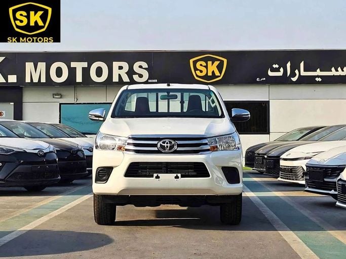 Новый Toyota Hilux VIII Рестайлинг 2, 2.4 л, 2025 в Дубае от SK Motors Белый цвет. GCC | AUTO.AE