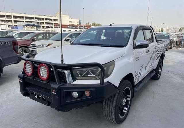 Used Toyota Hilux VIII, 2.8 l, 2019 in Dubai by Alhamd Motors, White color. Other | AUTO.AE