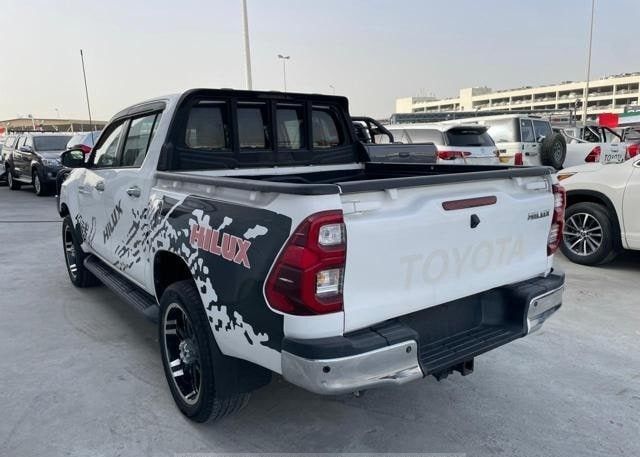 Used Toyota Hilux VIII, 2.8 l, 2019 in Dubai by Alhamd Motors, White color. Other | AUTO.AE
