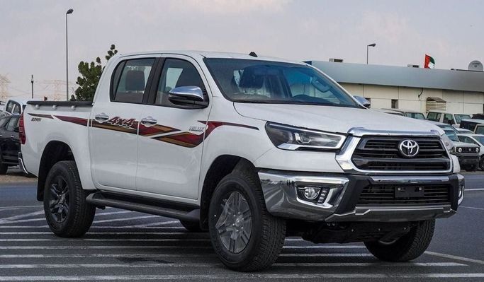 Новый Toyota Hilux VIII Рестайлинг, 2.7 л, 2025 в Дубае от Najem Motors Белый цвет. GCC | AUTO.AE