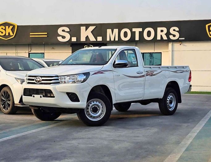 New Toyota Hilux VIII Facelift, 2.7 l, 2025 in Dubai by SK Motors, White color. GCC Specs | AUTO.AE