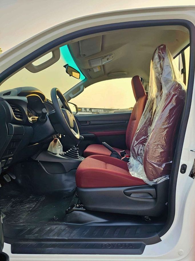 New Toyota Hilux VIII Facelift, 2.7 l, 2025 in Dubai by SK Motors, White color. GCC Specs | AUTO.AE