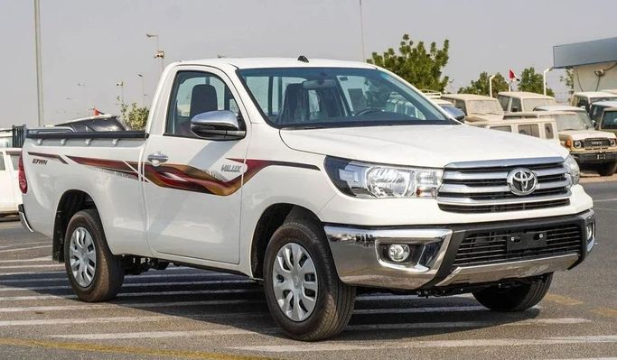 Новый Toyota Hilux Extra Cab VIII Рестайлинг, 2.4 л, 2025 в Дубае от Najem Motors Белый цвет. GCC | AUTO.AE