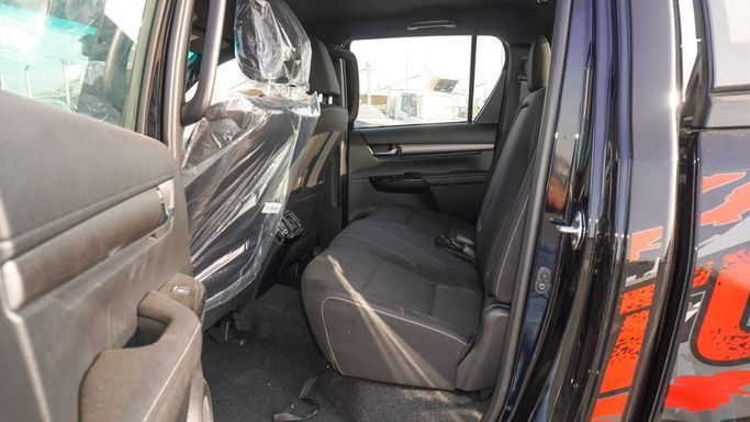 New Toyota Hilux VIII Facelift, 4.0 l, 2025 in Dubai by Najem Motors, Black color. GCC Specs | AUTO.AE