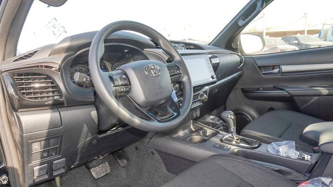 New Toyota Hilux VIII Facelift, 4.0 l, 2025 in Dubai by Najem Motors, Black color. GCC Specs | AUTO.AE