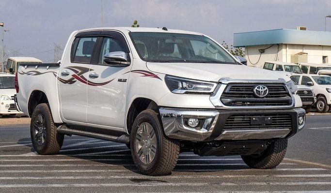 New Toyota Hilux VIII Facelift 2, 2.7 l, 2025 in Dubai by Najem Motors, White color. GCC Specs | AUTO.AE