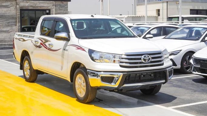 New Toyota Hilux VIII Facelift, 2.7 l, 2025 in Dubai by Najem Motors, White color. GCC Specs | AUTO.AE