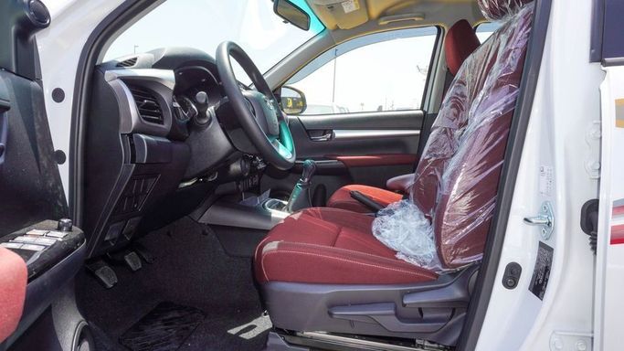 New Toyota Hilux VIII Facelift, 2.7 l, 2025 in Dubai by Najem Motors, White color. GCC Specs | AUTO.AE