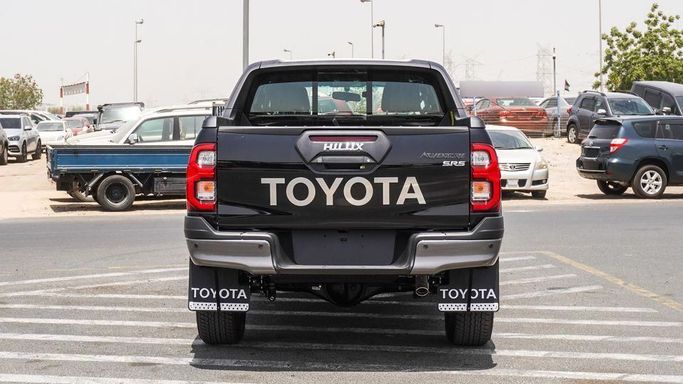 New Toyota Hilux VIII Facelift, 4.0 l, 2025 in Dubai by Najem Motors, Black color. GCC Specs | AUTO.AE