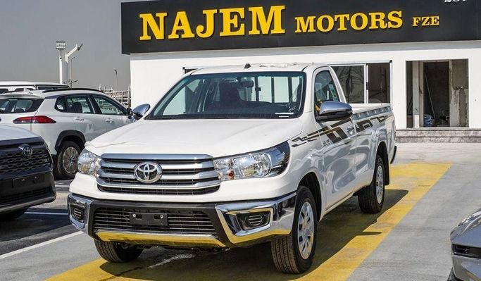 Новый Toyota Hilux Extra Cab VIII Рестайлинг, 2.4 л, 2025 в Дубае от Najem Motors Белый цвет. GCC | AUTO.AE