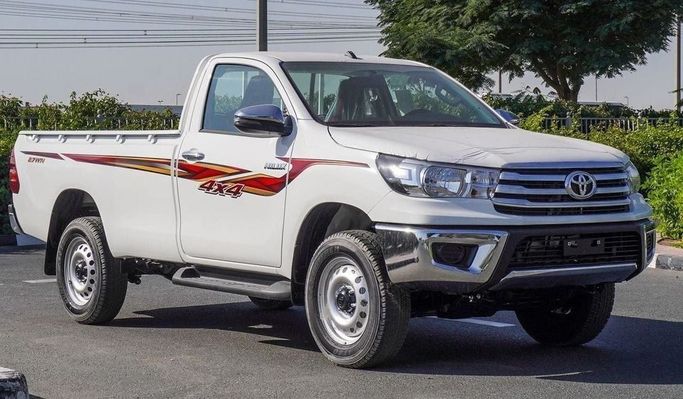 Новый Toyota Hilux Extra Cab VIII Рестайлинг, 2.4 л, 2025 в Дубае от Najem Motors Белый цвет. GCC | AUTO.AE