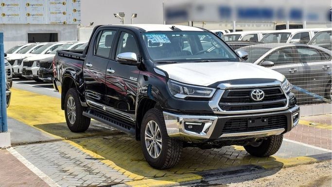 New Toyota Hilux VIII Facelift, 2.7 l, 2024 in Dubai by Najem Motors, Black color. GCC Specs | AUTO.AE