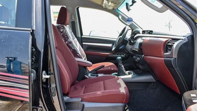 New Toyota Hilux VIII Facelift, 2.7 l, 2024 in Dubai by Najem Motors, Black color. GCC Specs | AUTO.AE