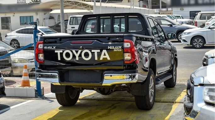 New Toyota Hilux VIII Facelift, 2.7 l, 2024 in Dubai by Najem Motors, Black color. GCC Specs | AUTO.AE