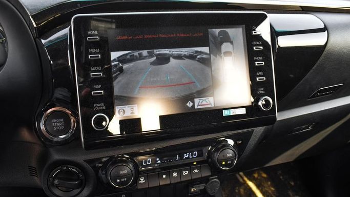 New Toyota Hilux VIII Facelift, 4.0 l, 2024 in Dubai by Najem Motors, Grey color. GCC Specs | AUTO.AE