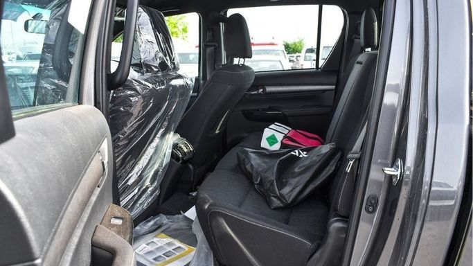 New Toyota Hilux VIII Facelift, 4.0 l, 2024 in Dubai by Najem Motors, Grey color. GCC Specs | AUTO.AE