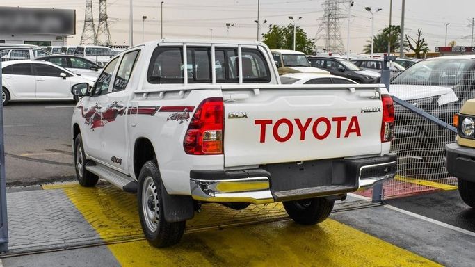 New Toyota Hilux VIII Facelift 2, 2.7 l, 2024 in Dubai by Najem Motors, White color. GCC Specs | AUTO.AE