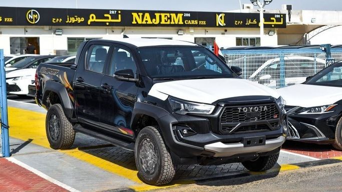New Toyota Hilux VIII Facelift, 4.0 l, 2024 in Dubai by Najem Motors, Black color. GCC Specs | AUTO.AE