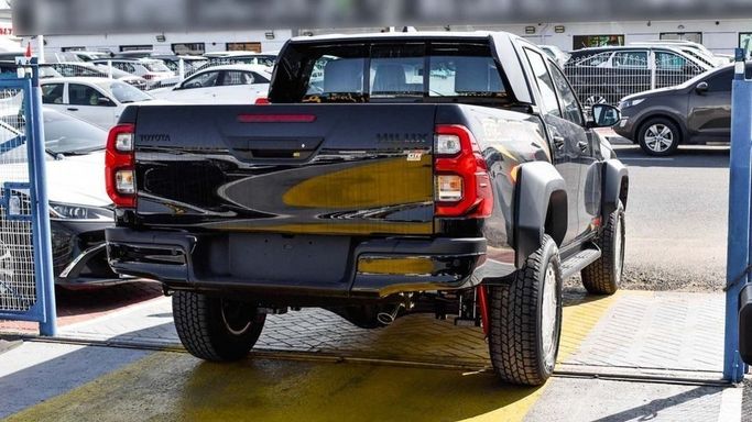 New Toyota Hilux VIII Facelift, 4.0 l, 2024 in Dubai by Najem Motors, Black color. GCC Specs | AUTO.AE
