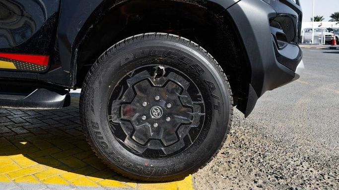 New Toyota Hilux VIII Facelift, 4.0 l, 2024 in Dubai by Najem Motors, Black color. GCC Specs | AUTO.AE