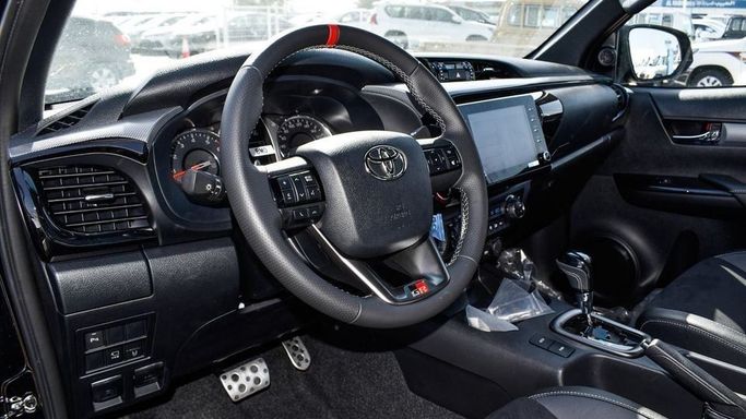 New Toyota Hilux VIII Facelift, 4.0 l, 2024 in Dubai by Najem Motors, Black color. GCC Specs | AUTO.AE