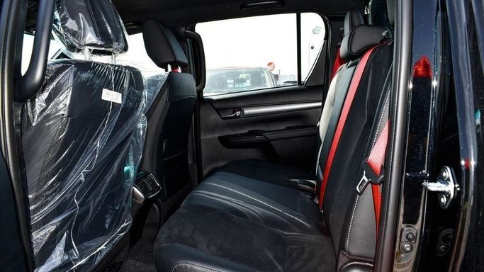 New Toyota Hilux VIII Facelift, 4.0 l, 2024 in Dubai by Najem Motors, Black color. GCC Specs | AUTO.AE