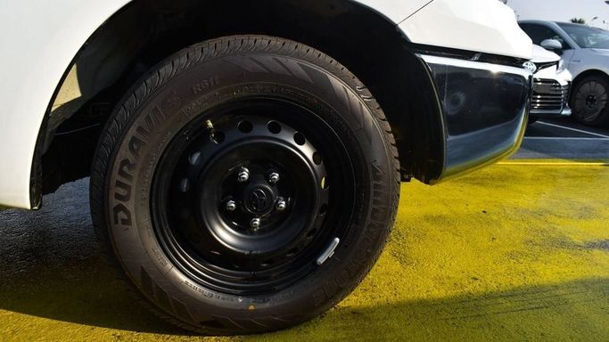 New Toyota Hilux Extra Cab VIII Facelift, 2.4 l, 2024 in Dubai by Najem Motors, White color. GCC Specs | AUTO.AE