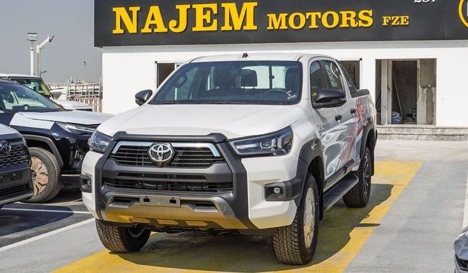 New Toyota Hilux VIII Facelift, 2.7 l, 2023 in Dubai by Najem Motors, White color. GCC Specs | AUTO.AE