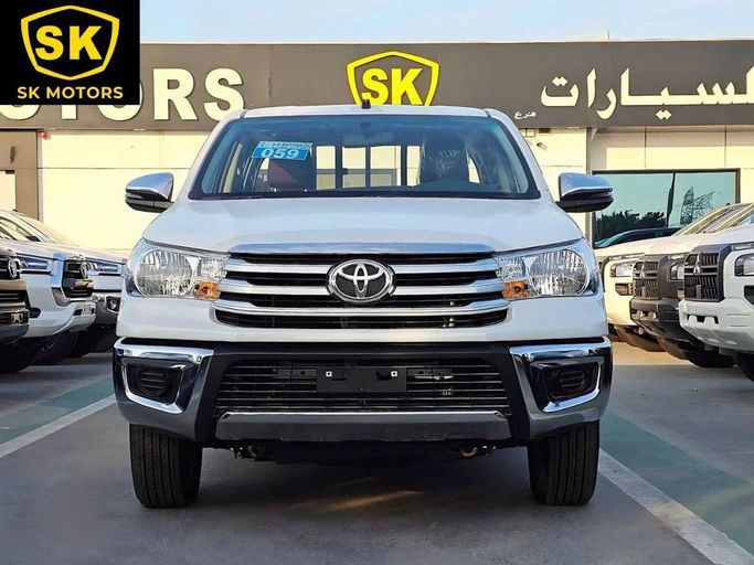 New Toyota Hilux VIII Facelift 2, 2.7 l, 2024 in Dubai by SK Motors, White color. GCC Specs | AUTO.AE