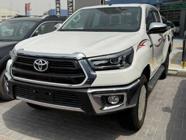 New Toyota Hilux VIII Facelift, 2.7 l, 2025 in Dubai by Soltan Auto, White color. GCC Specs | AUTO.AE
