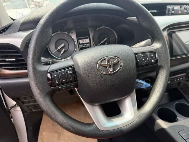 New Toyota Hilux VIII Facelift, 2.7 l, 2025 in Dubai by Soltan Auto, White color. GCC Specs | AUTO.AE
