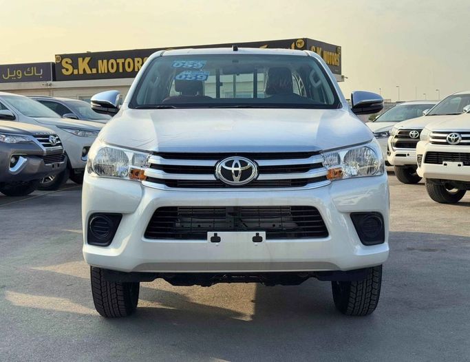 New Toyota Hilux VIII Facelift, 2.4 l, 2025 in Dubai by SK Motors, White color. GCC Specs | AUTO.AE