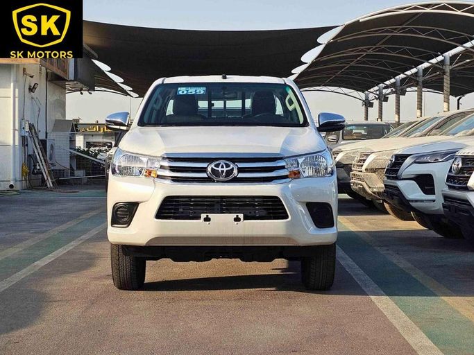 New Toyota Hilux VIII Facelift, 2.4 l, 2025 in Dubai by SK Motors, White color. GCC Specs | AUTO.AE