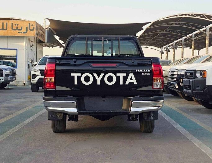 New Toyota Hilux VIII Facelift, 2.7 l, 2025 in Dubai by SK Motors, Black color. GCC Specs | AUTO.AE