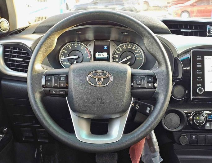 New Toyota Hilux VIII Facelift, 2.7 l, 2025 in Dubai by SK Motors, Black color. GCC Specs | AUTO.AE