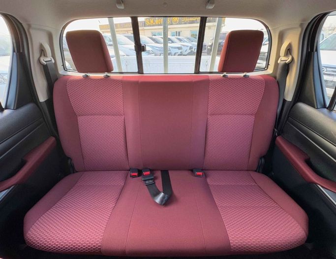 New Toyota Hilux VIII Facelift, 2.4 l, 2025 in Dubai by SK Motors, White color. GCC Specs | AUTO.AE