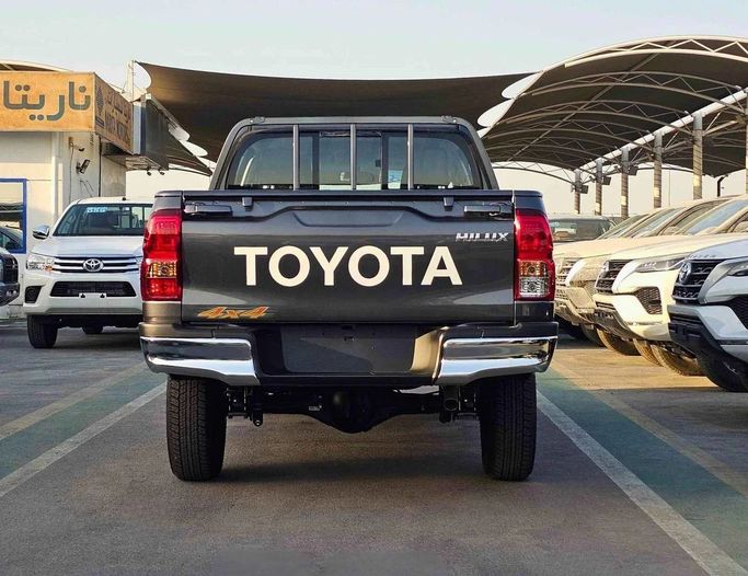 New Toyota Hilux VIII Facelift, 2.4 l, 2025 in Dubai by SK Motors, Grey color. GCC Specs | AUTO.AE