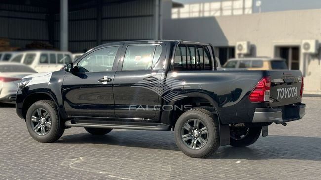Новый Toyota Hilux VIII Рестайлинг 2, 2.7 л, 2025 в Дубае от Falcons GT Motors FZCO Черный цвет. Европейская | AUTO.AE