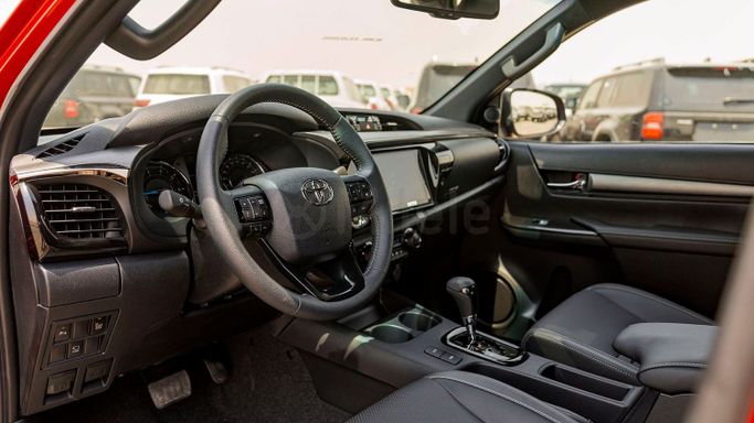 New Toyota Hilux VIII Facelift 2, 2.8 l, 2024 in Dubai by Milele, Red color. Other | AUTO.AE