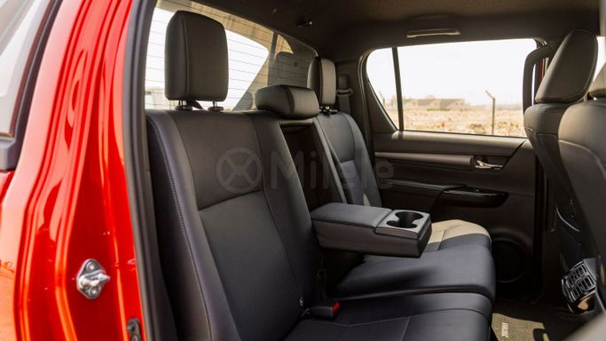 New Toyota Hilux VIII Facelift 2, 2.8 l, 2024 in Dubai by Milele, Red color. Other | AUTO.AE