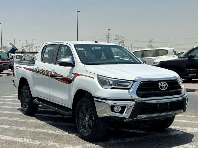 New Toyota Hilux VIII Facelift, 2.7 l, 2025 in Dubai by We Can Motors, White color. GCC Specs | AUTO.AE