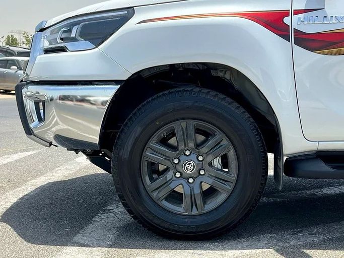 New Toyota Hilux VIII Facelift, 2.7 l, 2025 in Dubai by We Can Motors, White color. GCC Specs | AUTO.AE
