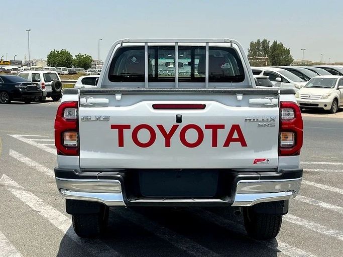 New Toyota Hilux VIII Facelift, 2.7 l, 2025 in Dubai by We Can Motors, White color. GCC Specs | AUTO.AE