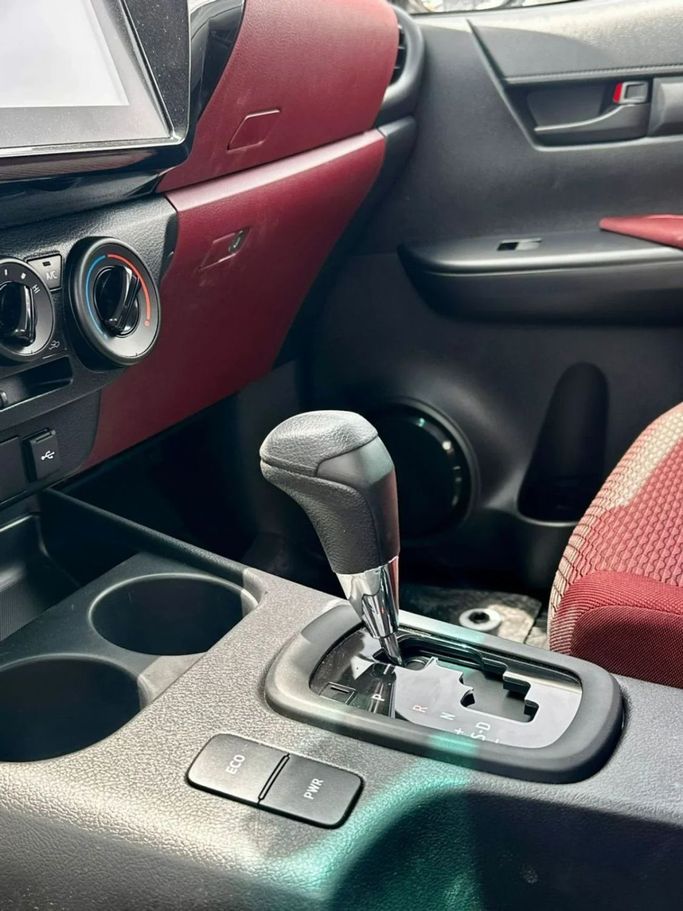 New Toyota Hilux Extra Cab VIII Facelift, 2.8 l, 2025 in Dubai by Pegasus Automobile, White color. GCC Specs | AUTO.AE